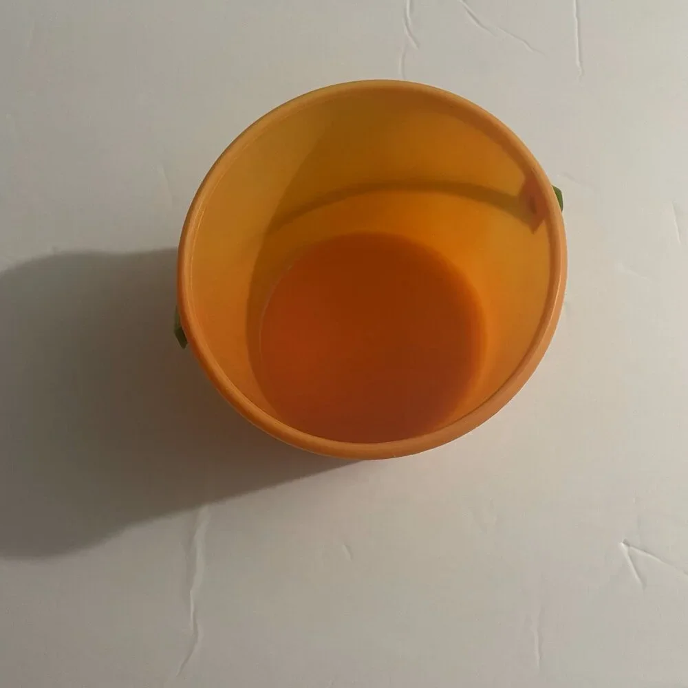 Small Orange Pail with Green Handle